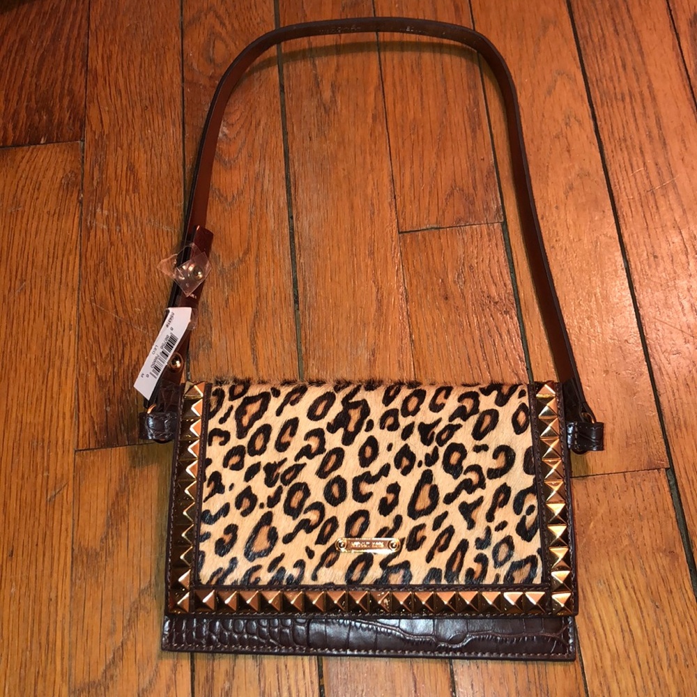 NWT Micheal Kors clutch with small strap